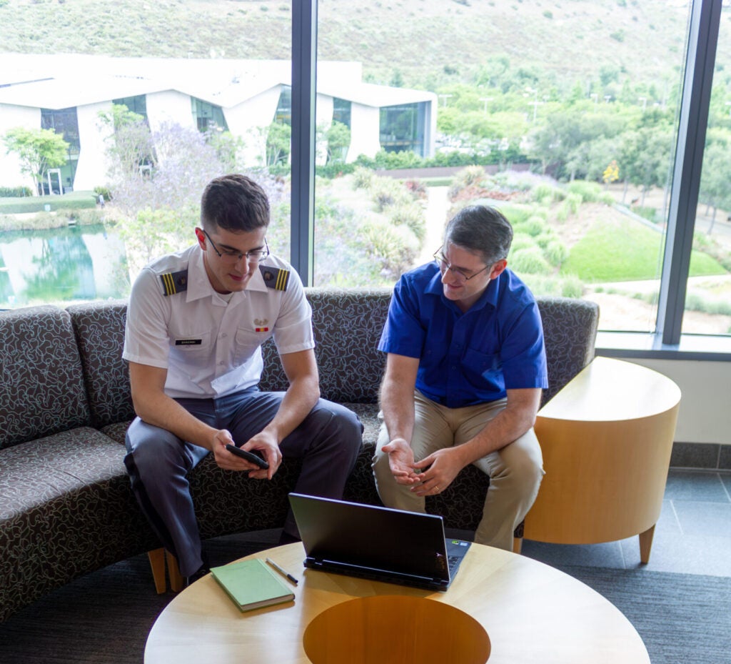 Benjamin Nye i(pictured, right) s one of the lead researchers at the Artificial Intelligence Research Center of Excellence for Education, a two-year, $4.5 million initiative funded by Congress that is applying artificial intelligence to military education. (USC Photo: Courtesy of the USC Institute for Creative Technologies)