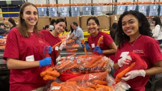 Keck School of Medicine volunteers getting food ready for distribution