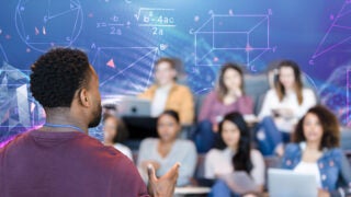 Lecturer with students in background