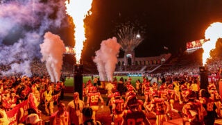 Football team comes onto the field