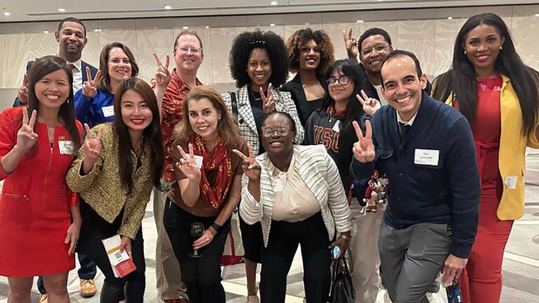Smiles, stories, and cardinal and gold — alumni celebrate the Trojan Family in Chicago.