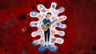 Illustration of a woman, wearing a blue shirt, black pants and black shoes, playing a brown acoustic guitar with pink and blue flowers and black COVID cells on a cardinal and white background