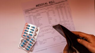 Medical bill, prescriptions and empty wallet