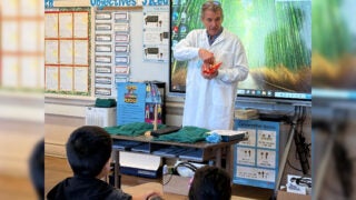 Chuck Murry gives third-graders an anatomy lesson