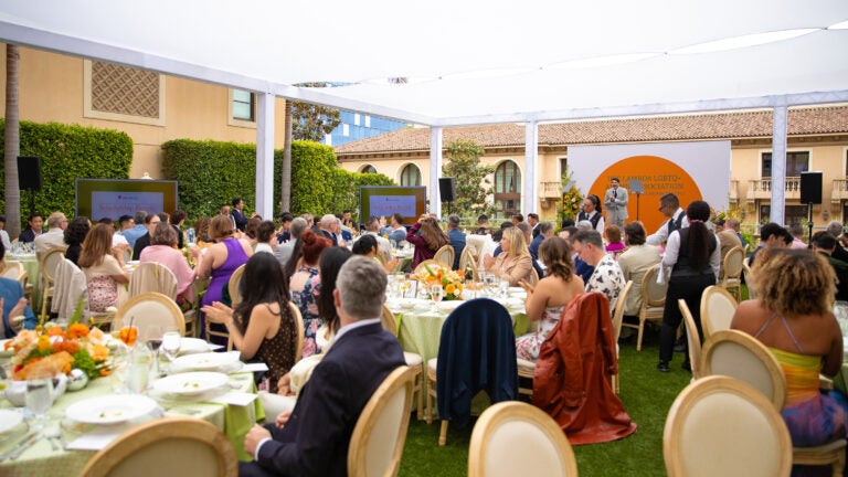 Guests at the garden party heard from the association’s staff and elected leadership during the event, which honored four Trojans for their accomplishments and contributions to the LGBTQ+ community. (Photo/Ligia Chin Photography)